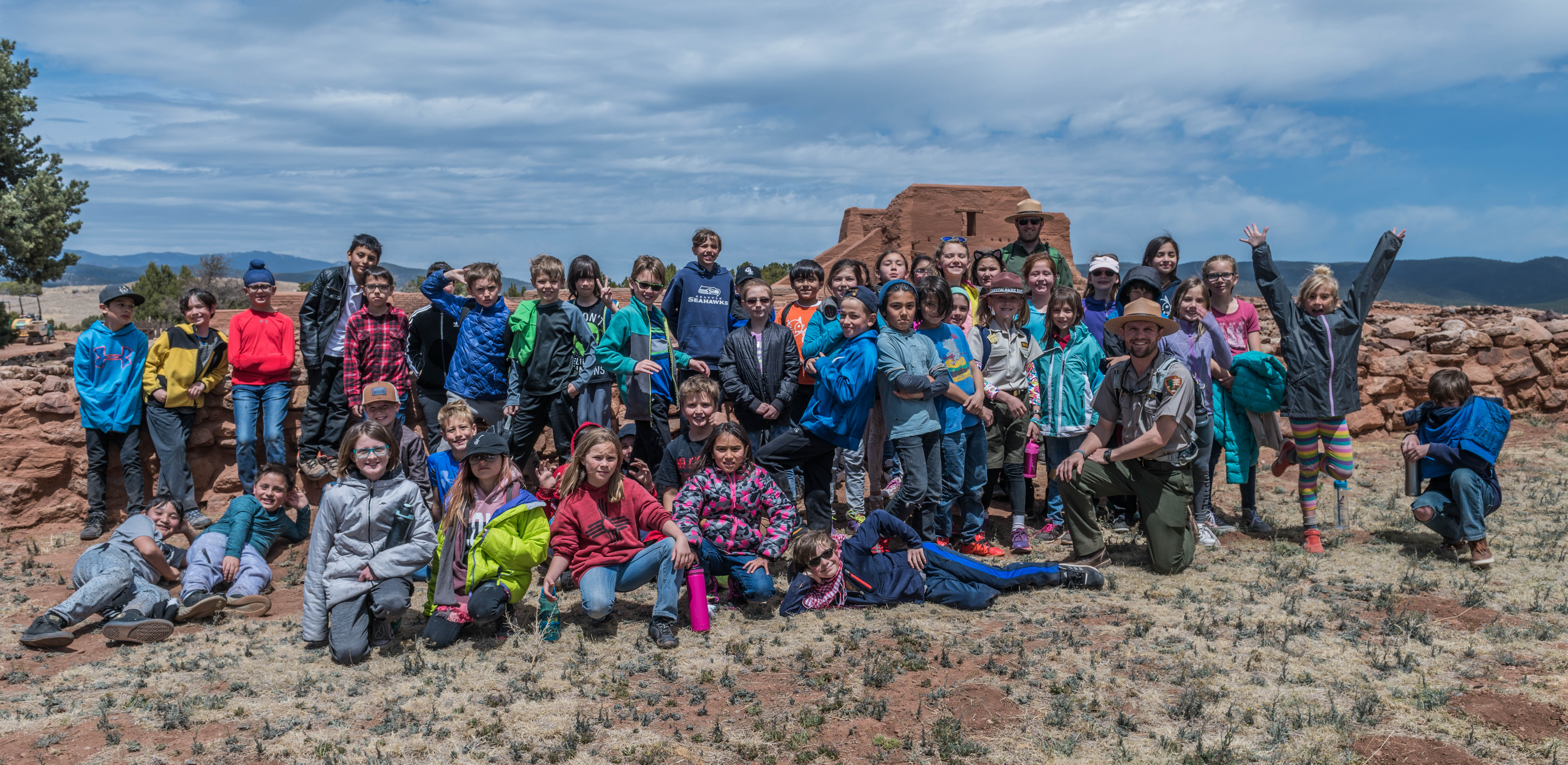 School kids celebrating a field trip to Pecos NHP with a class photo