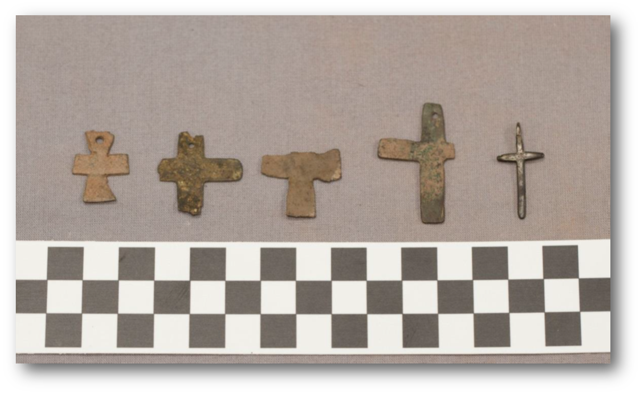 Rosaries from the Lost Church Artifacts lined in a row.