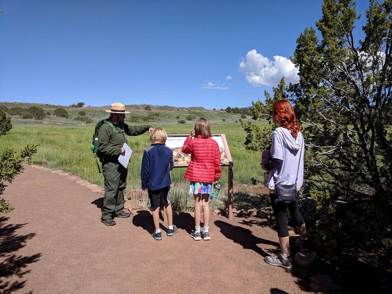 A ranger giving visitors an interpretive program.