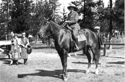Vintage photo of female ranger on horseback Vintage photo of female ranger on horseback