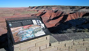 wayside on stone wall overlooking Painted Desert