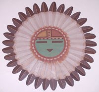 colorful Hopi sun face surrounded by feathers colorful Hopi sun face surrounded by feathers