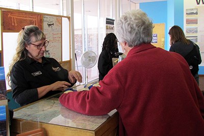 Lisa and Qua help visitors at the Painted Desert Visitor Center