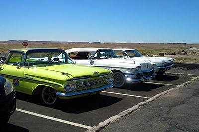 Colorful classic cars parked at Crystal Forest