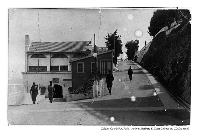 men walking around Alcatraz island c1920s