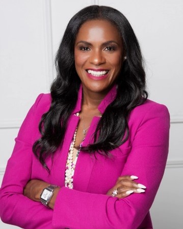 Black woman in pink suit 