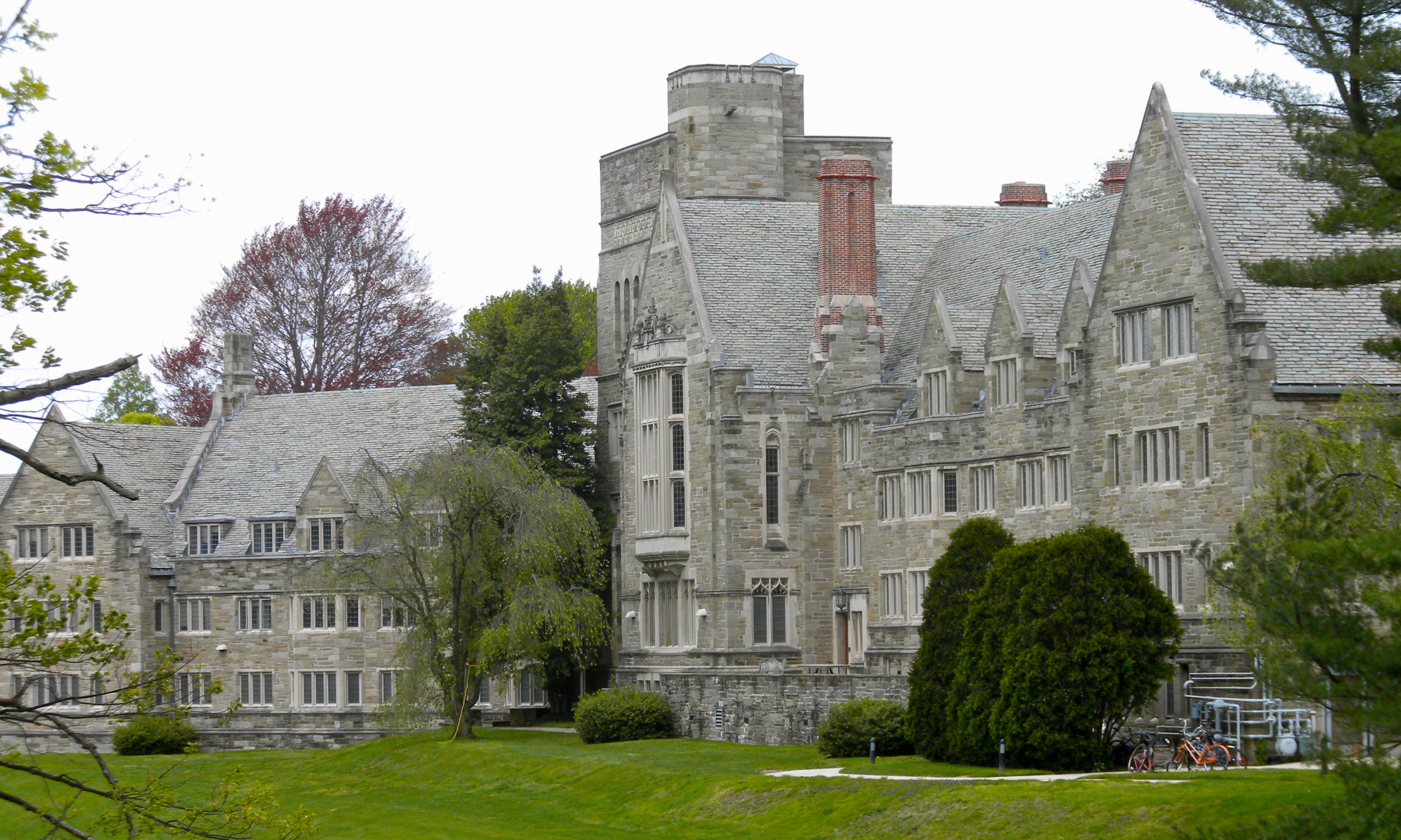 Exterior image of a large gray stone building.