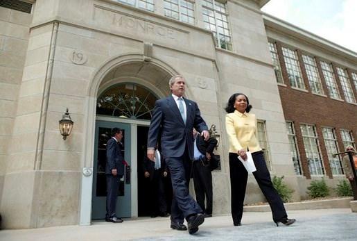 President Bush walks out of Monroe Elementary with Cheryl Brown Henderson