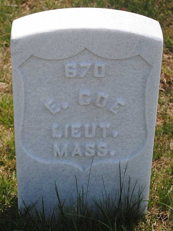 Headstone text reads 670 E. Coe Lieut. Mass.
