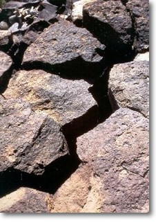 Photograph of fractured columnar basalt. Photograph of fractured columnar basalt.