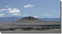 Volcanic landscape with blue sky Volcanic landscape with blue sky