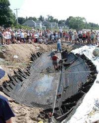 A Photograph of the HMS Hunter’s Wreckage Being Unearthed (Excavation). A Photograph of the HMS Hunter’s Wreckage Being Unearthed (Excavation).