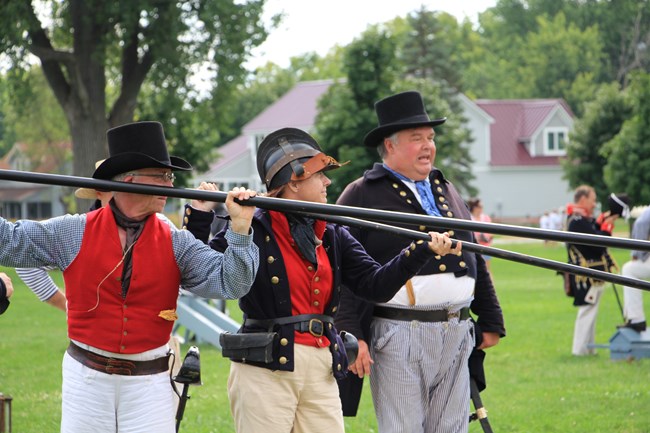 1812 sailors demonstrating how to use boarding pikes