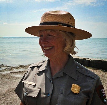 Smiling Park Ranger on beach