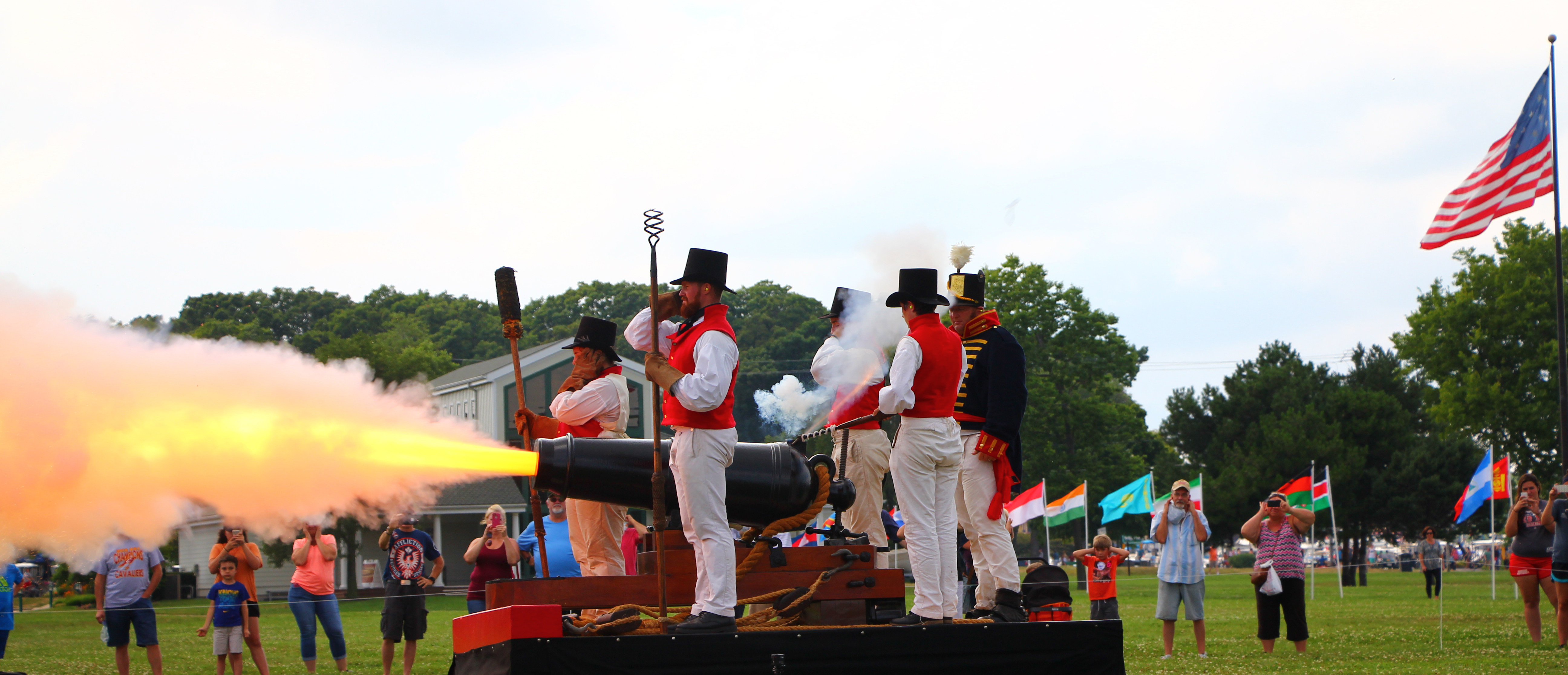 Carronade fires with blast of fire. Carronade, black naval cannon, fires with a blast of fire and smoke.
