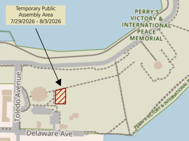 Map of Perry's Victory and International Peace Memorial with a red hatched area to the east of visitor center. Area is marked with text "Temporary Public Assembly Area 7/29/2026 - 8/3//2026
