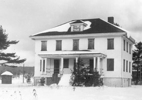 This black and white photo depicts the Munising Coast Guard station in 1968. This black and white photo depicts the Munising Coast Guard station in 1968.