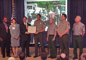 Pictured Rocks National Lakeshore employees receive the 2002 White House Closing the Circle Award.