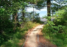 This sandy trail leads to the beach at Sand Point near Munising. This sandy trail leads to the beach at Sand Point near Munising.