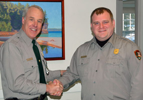 Superintendent Jim Northup welcomes Bruce Leutscher as the lakeshore's new Chief of Science and Natural Resources.