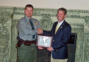 Michael Teranes receives an NPS Search and Rescue Award from Chief Ranger Tim Colyer.