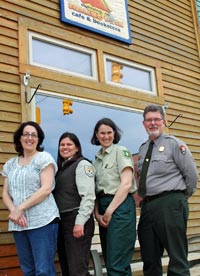 Local organizers of science cafes stop for a photo outside the Falling Rock Cafe. Nancy, Sara, Janel, Gregg