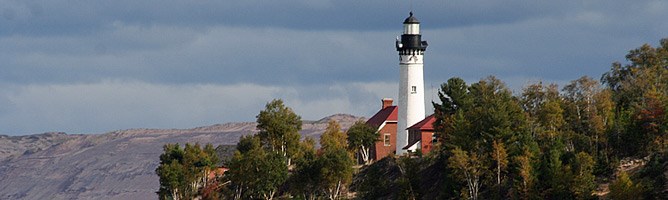 Au Sable Light Station and Grand Sable Dunes as viewed from Lake Superior. Au Sable Light Station and Grand Sable Dunes as viewed from Lake Superior.