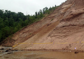 Grand Sable Dunes - undercut and eroding into Sable Creek and Lake Superior. Grand Sable Dunes - undercut and eroding into Sable Creek and Lake Superior.