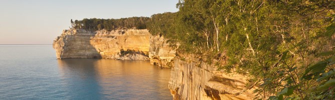 View of Indianhead Point from atop the Pictured Rocks Cliffs. Photograph from the book, Pictured Rocks - From Land and Sea, by Craig Blacklock. View of Indianhead Point from atop the Pictured Rocks Cliffs. Photograph from the book, Pictured Rocks - From Land and Sea, by Craig Blacklock.