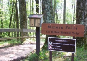 The trail to Miners Falls features a self-guided nature guide. The trail to Miners Falls features a self-guided nature guide.