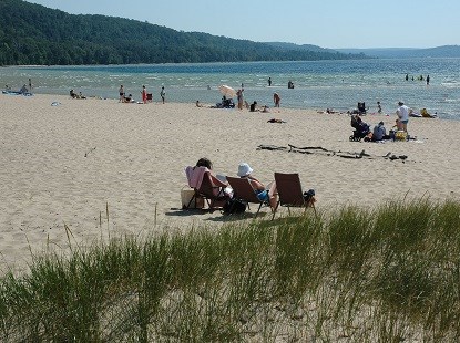 People enjoying Sand Point Beach People enjoying Sand Point Beach