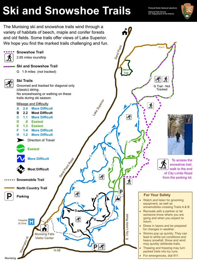 Map showing the different ski trails and the snowshoe trail, as well as the mileage and difficulty rating of trails, and parking locations.