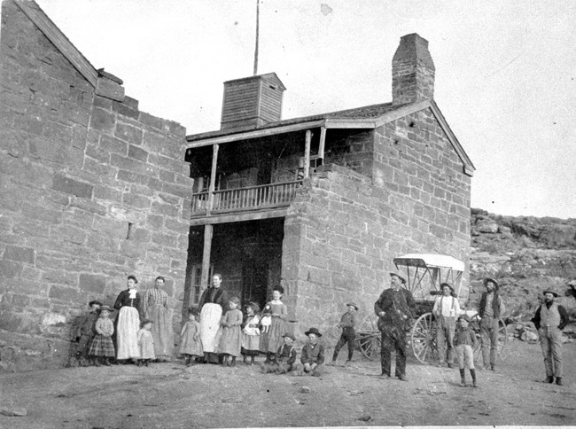 Black and white photo of people standing in front of Winsor Castle, 1891