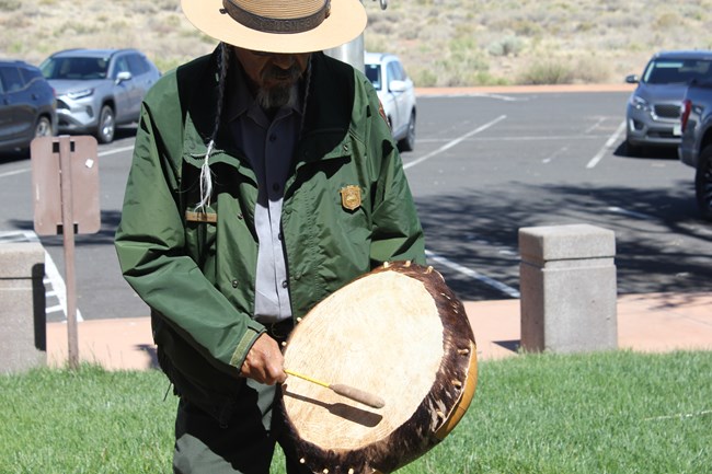 A Southern Paiute Ranger drums