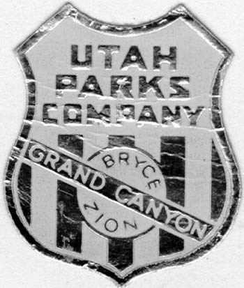 Black and white images of metal sign reading "Utah Parks Company, Grand Canyon, Bryce, Zion"