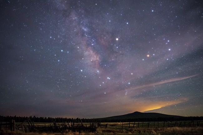 View of the night sky and Milky Way over Mount Dellenbaugh.
