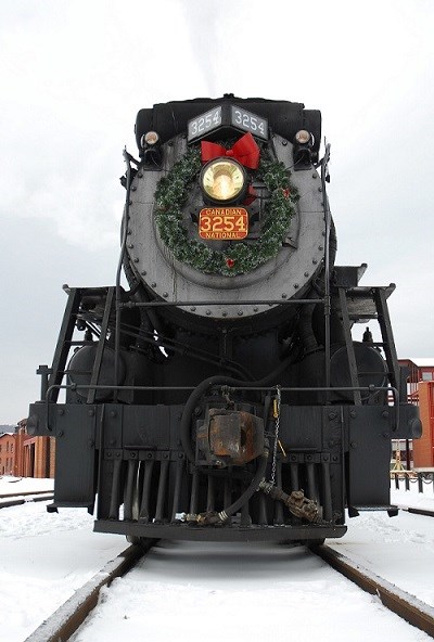 STEA Holiday Express 2 Steam train decorated with a wreath