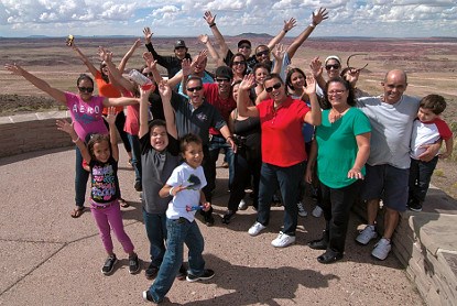 Group of people on patio in desert landscape