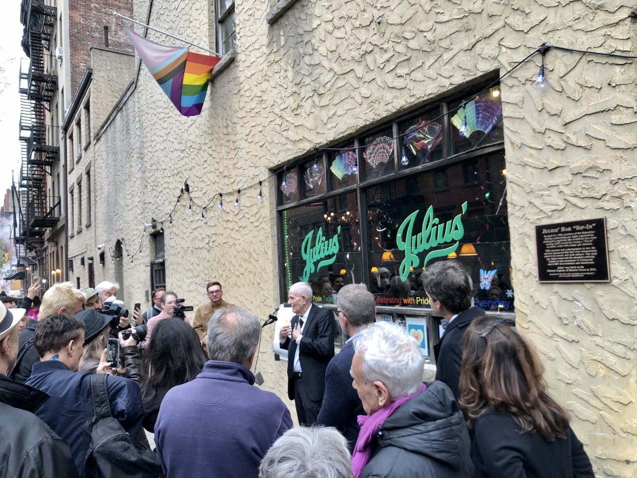 Randy Wicker speaking during the sip in Historic Registry plaque dedication