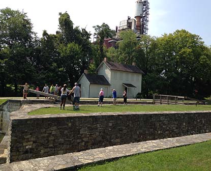 Tour group open and close a historic lift lock at the C&O Canal