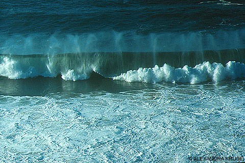 Ocean waves breaking.