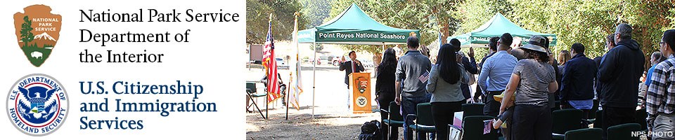 Logos for the National Park Service and the U.S. Citizenship and Immigration Service (left) and a picture of citizenship candidates with raised right hands taking an oath during the 2018 Naturalization Ceremony at Point Reyes National Seashore.