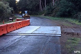 Steel plate covering collapsed culvert on Limantour Road.