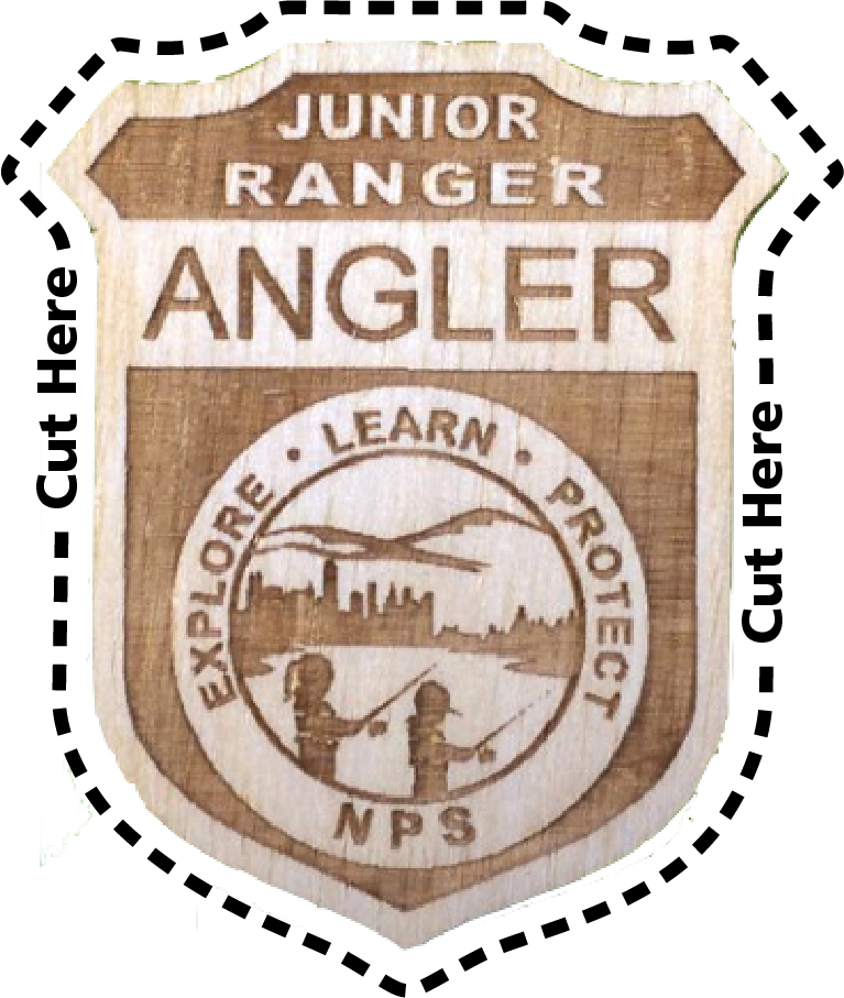 Junior Ranger Angler badge. Badge artwork says Explore, Lear, Protect, NPS. Image inside circle shows two children fishing at a lake near a city. 