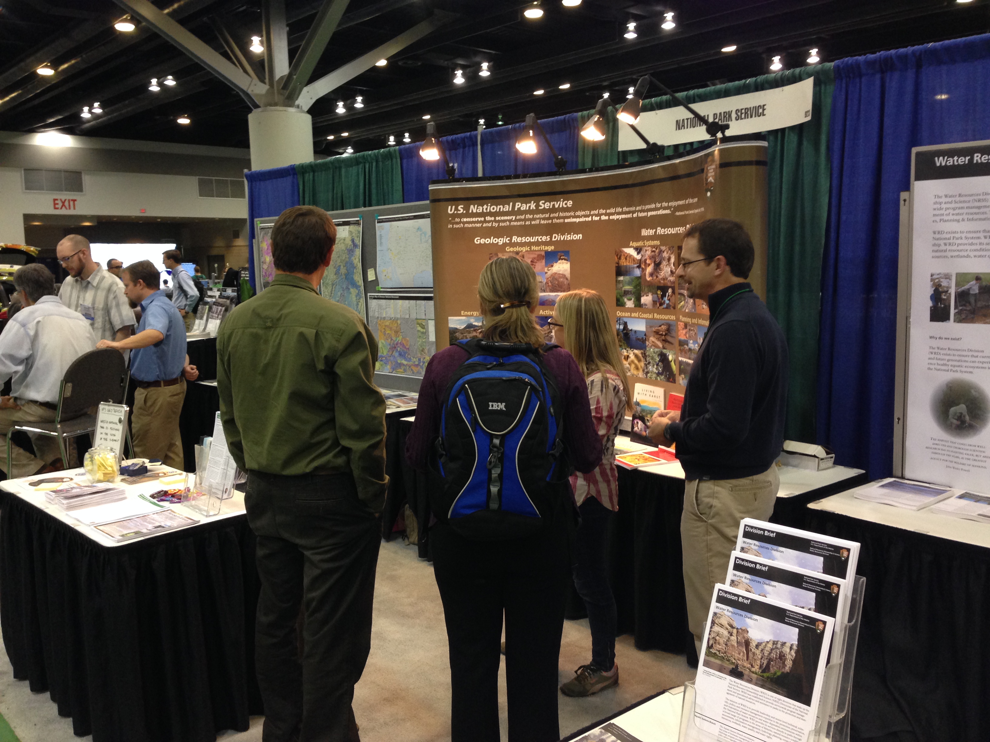 Conference attendees visit the NPS booth at the GSA conference in 2015
