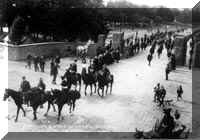 The 51st Iowa Volunteer Infantry Regiment passes through the Lombard Gate on the way to the Philippines.