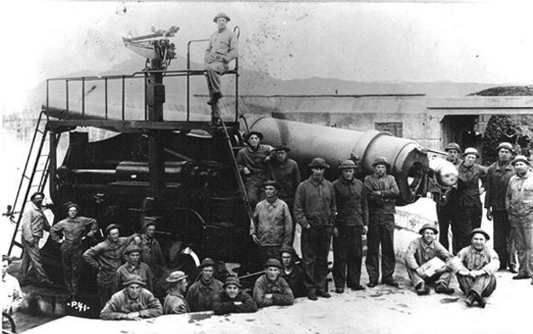 An artilley crew poses with a 10-inch gun at Battery Marcus Miller