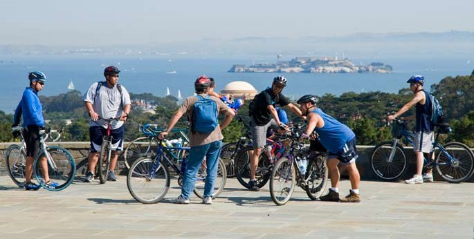 Bicyclists take in the view at Inspiration Point.