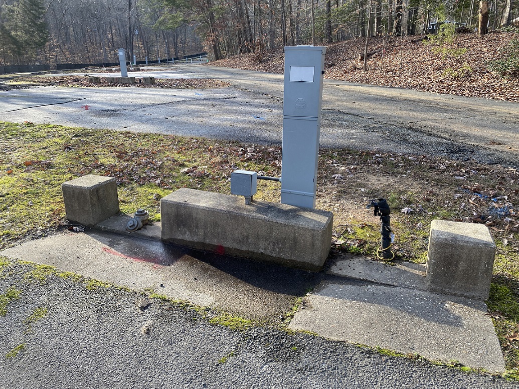 Adverse Effect Concrete Structures Concrete structures around utilities in empty campground effected by infrastructure improvements