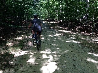 Biker on Lake One road